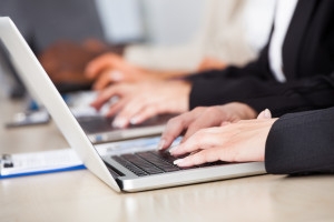 Woman using laptop.