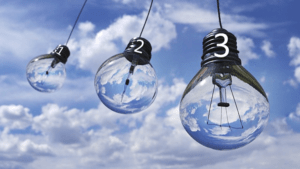 How to Keep Text Together in Microsoft Word showing clouds and lightbulbs.