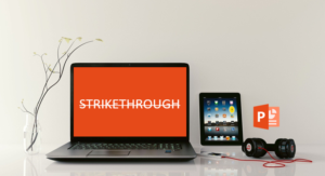 Strikethrough text in PowerPoint in laptop.