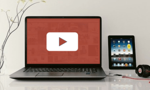Embed a YouTube video in PowerPoint represented by a laptop with play button.