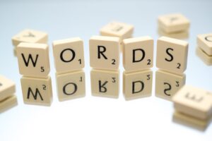 Stop words splitting at the end of a line in Word represented by scrabble letters
