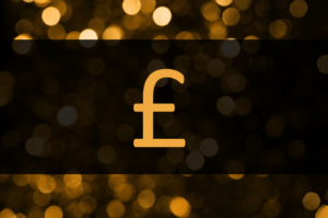 Insert the pound symbol in Word represented by British pound symbol on a black background.