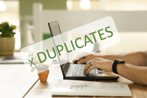 Remove or delete duplicates in Excel represented by a laptop with X duplicates as an overlay.