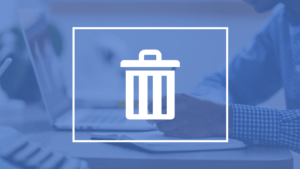 Delete a page in Word represented by a trash can overlayed on a person working on a laptop.